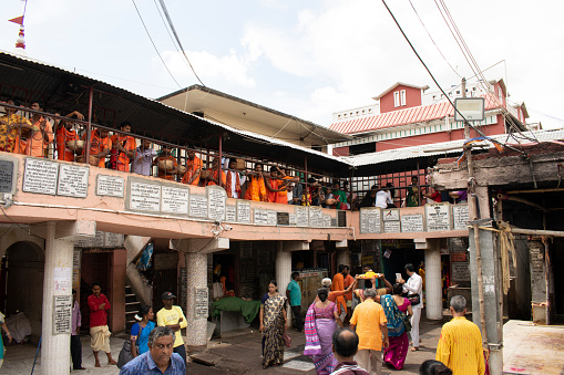 tarapith temple, west bengal, india - july 05, 2023 : devotees queued up to visit hindu goddess