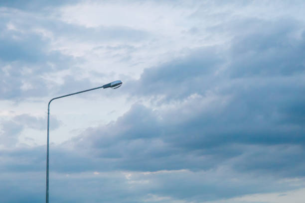 evening sky with light bulbs The sky is overcast and it's about to rain.