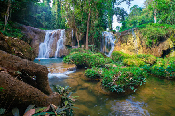 istock Serenity waterfall in tropical rain foerst mountain nature lands 1524142054