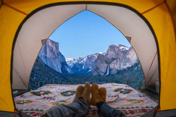 istock traveller sleep in tent with yosemite national park view 1524256540