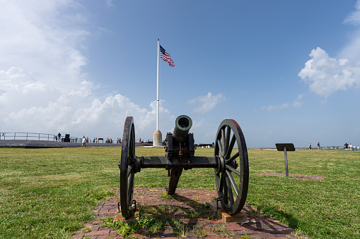 A Cannon at Fort Sumter National Monument with Charleston Harbor in the Background.