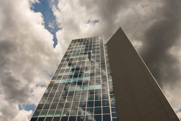 istock STUTTGART,GERMANY - AUGUST 09,2019:Engstlatter Weg This is the tall administration building of Daimler,the huge car company. 1524289351