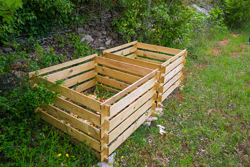 flower beds with flowers made of wooden pallets.