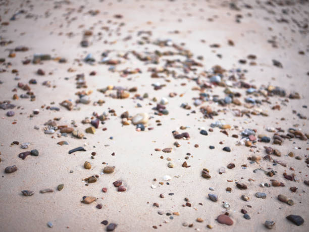 Empty pebble beach by the sea background .
