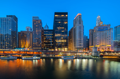 Cityscape of Chicago Riverwalk at Dusable bridge over Michigan river in 7Apr2023, Chicago city, USA