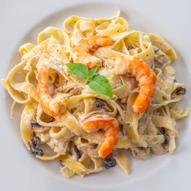 istock mushroom cream sauce spaghetti with shrimp 1524441408