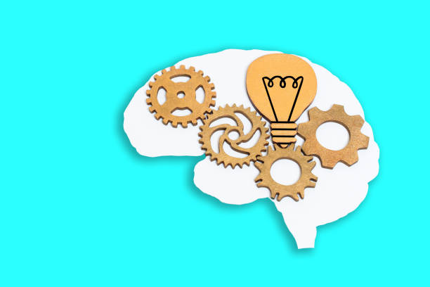 istock Brain Shape with Wooden Gears and Light Bulb 1524471795