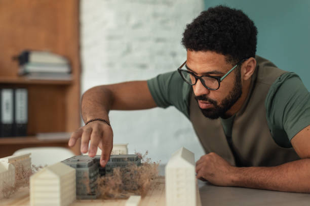 istock Young architect hard working on design of new house, building. 1524496476