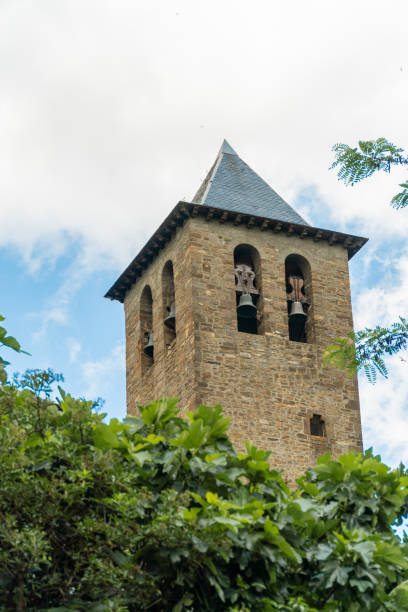 Torla church, pyrenee style on a cloudy day.j