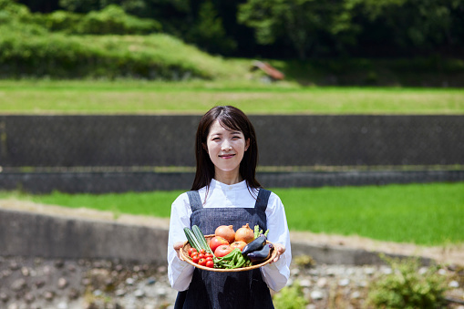 Japanese woman with vegetables