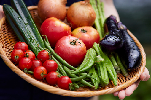 Japanese woman with vegetables