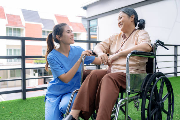 istock Caucasian Nurses assisting elderly people at retirement home. 1524588405