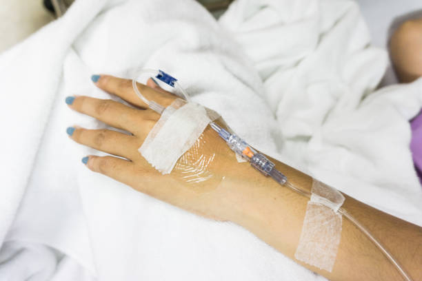 istock Sickness of hands with intravenous to patient's 1524687405