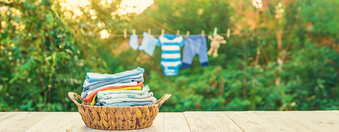 Wet clothes drying in the sun. Laundry  hanging in back yard. Galicia, Spain.