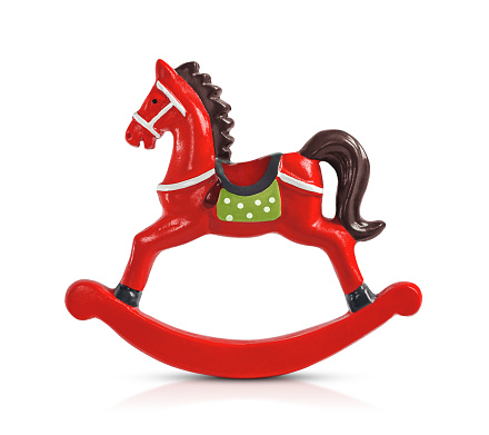 a toy red rocking horse is highlighted on a white background