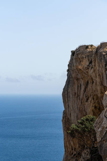 istock Cliff sea with sky in background 1524743311