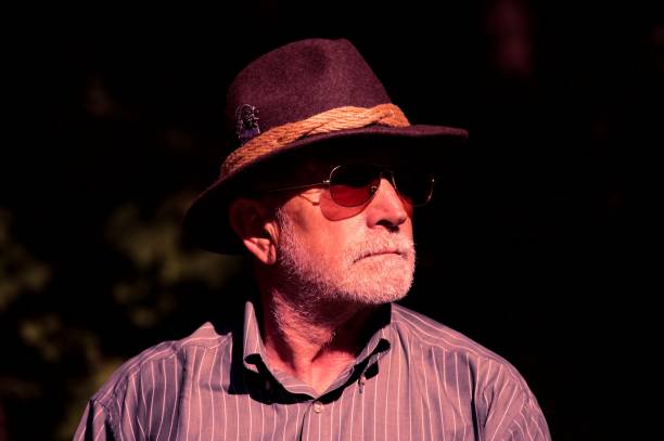 istock Senior man with hunting hat 1524814338