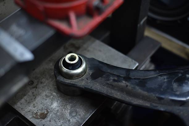 istock replacement of the front axle arm bearing on the workshop hydraulic press 1524816947