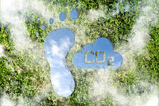 Carbon dioxide cloud and sustainability concept with carbon footprint