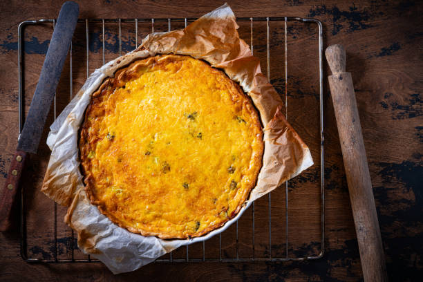 Vegetables quiche homemade on wooden rustic table