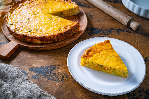 istock Vegetables quiche slice on plate homemade on wooden rustic table 1524830112