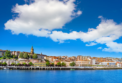 Portugalete skyline in sunny summer day with Ria de Bilbao Nervion river in Biscay in Basque country in Spain