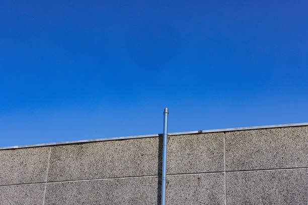 Corner wall of a garden at sunset