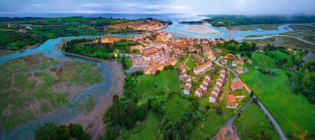 San Vicente de la Barquera aerial view village at sunset in Cantabria of Spain