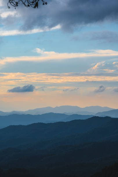 istock Sunset view and layers mountain at rural area chiangmai. 1524929412
