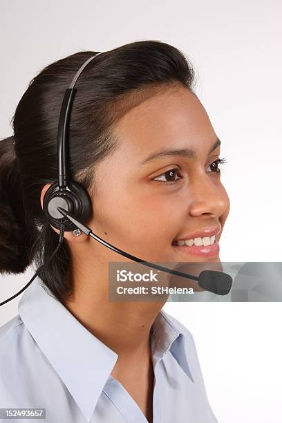 Beautiful Young Female Telephone Operator At Work Stock Photo - Download Image Now - Customer Service Representative, Studio Shot, Adult