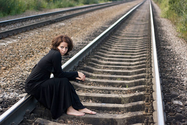 girl on railway stock photo