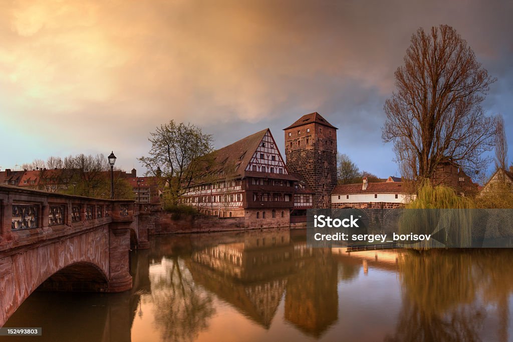 Painting of Nuremberg on the water Medieval house and fortifications in Nuremberg (Germany) Bavaria Stock Photo