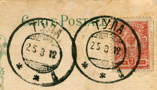 scan of old 1900's postmarks and postage stamp. high resolution. original rich texture preserved