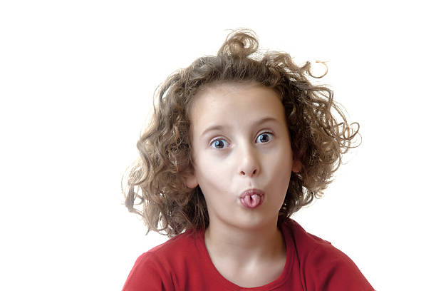 istock little girl making funny face 152494213