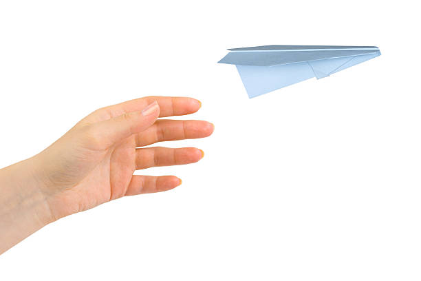 istock Hand and flying money plane 152494874