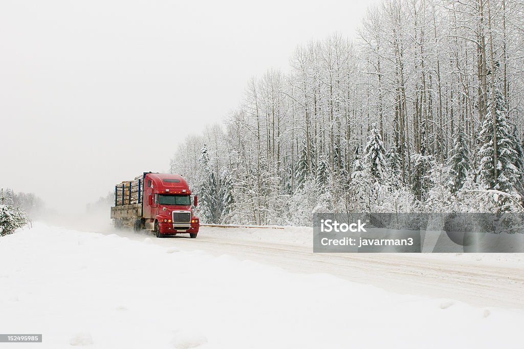 red truck on winter road Winter Stock Photo