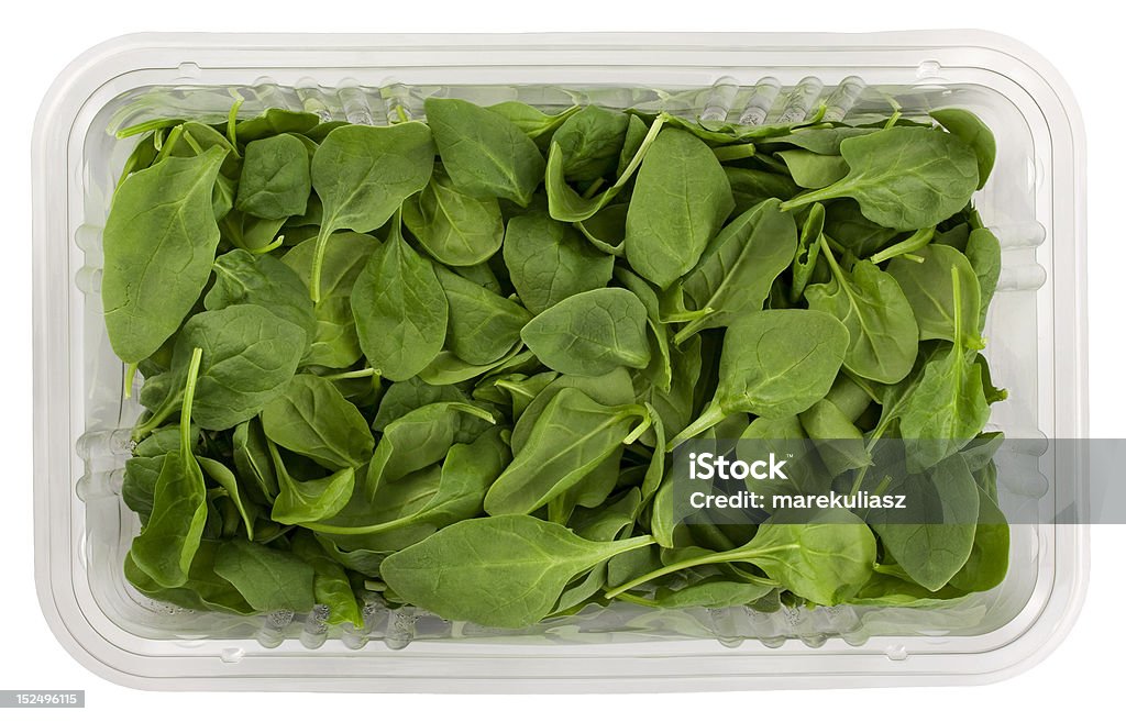 Verde bambino spinaci in una finestra trasparente - Foto stock royalty-free di Scatola
