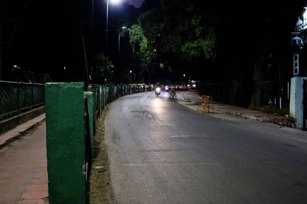 istock Empty road at night in Ooty valley Tamil Nadu, India 1524963297