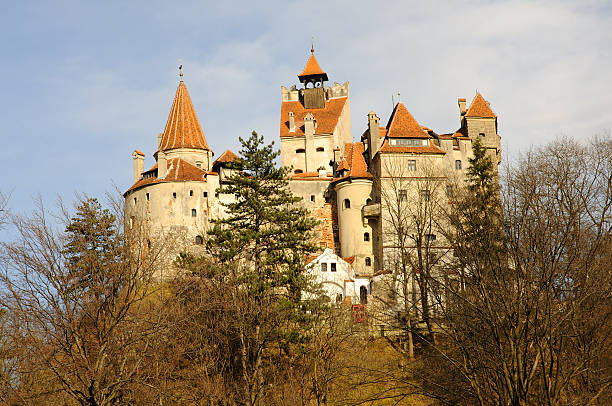 Dracula's Bran Castle in the light of sunset stock photo