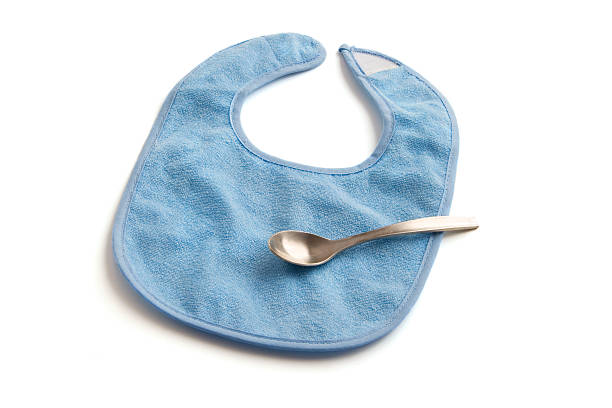 istock Blue Baby Bib and Spoon 152496553