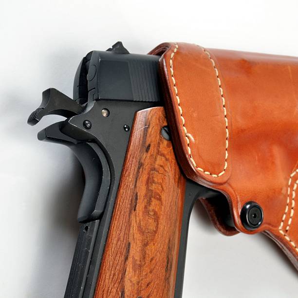 istock Cocked, Locked and Holstered .45 Caliber Pistol 152497342