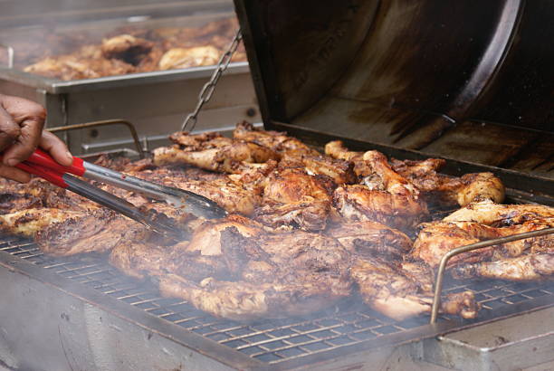 istock Barbecue chicken on a smoking grill 152497726