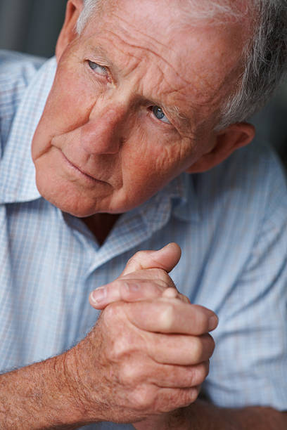istock Depressed elderly man lost in thought 152498584