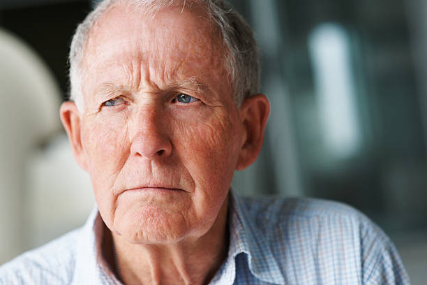 istock Lonely retired man looking away 152498585