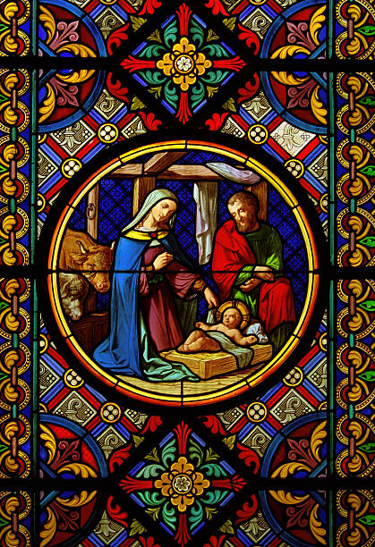 Christmas Cathedral stained glass window Jesus Maria Josef in the manger with the animals.