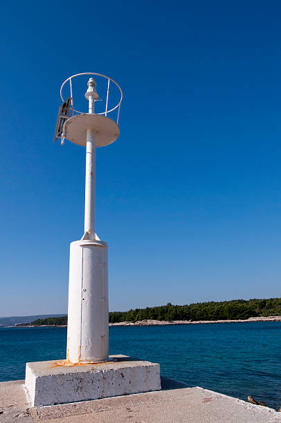 White lighthouse stock photo