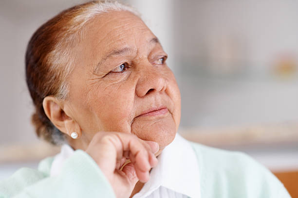 istock Contemplative senior patient looking away 152499803