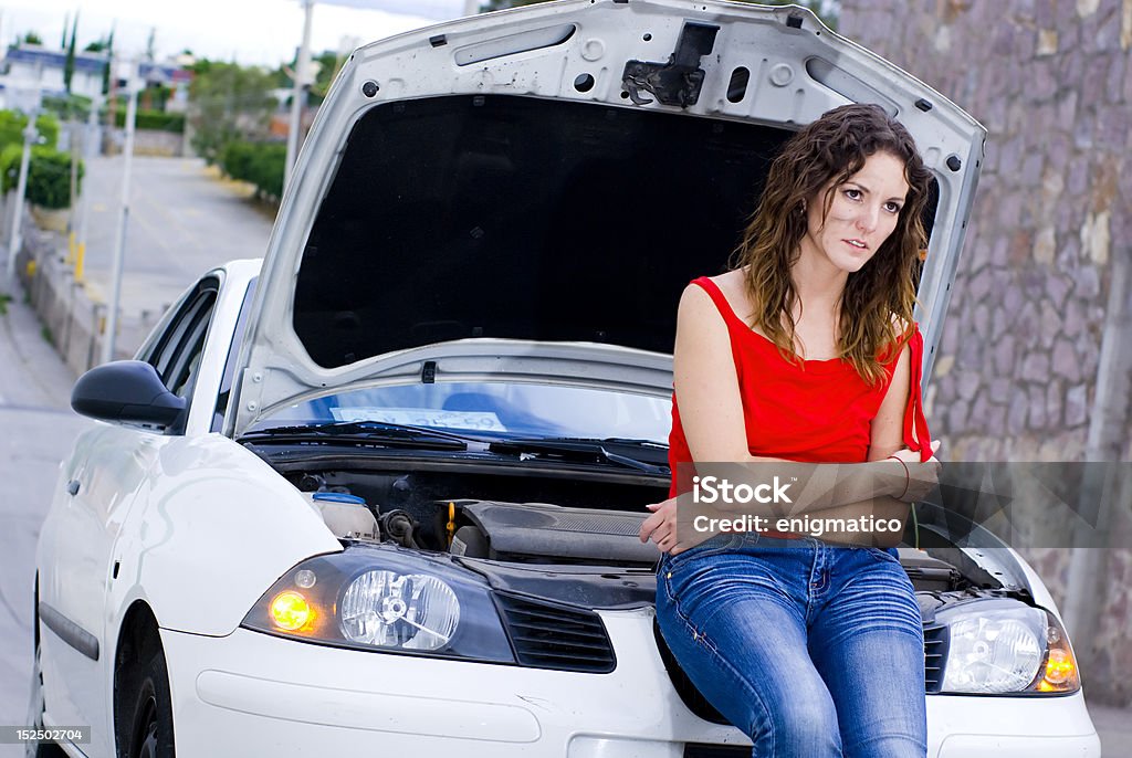 Woman waits mechanic Insurance car mechanic waiting Driveway Stock Photo
