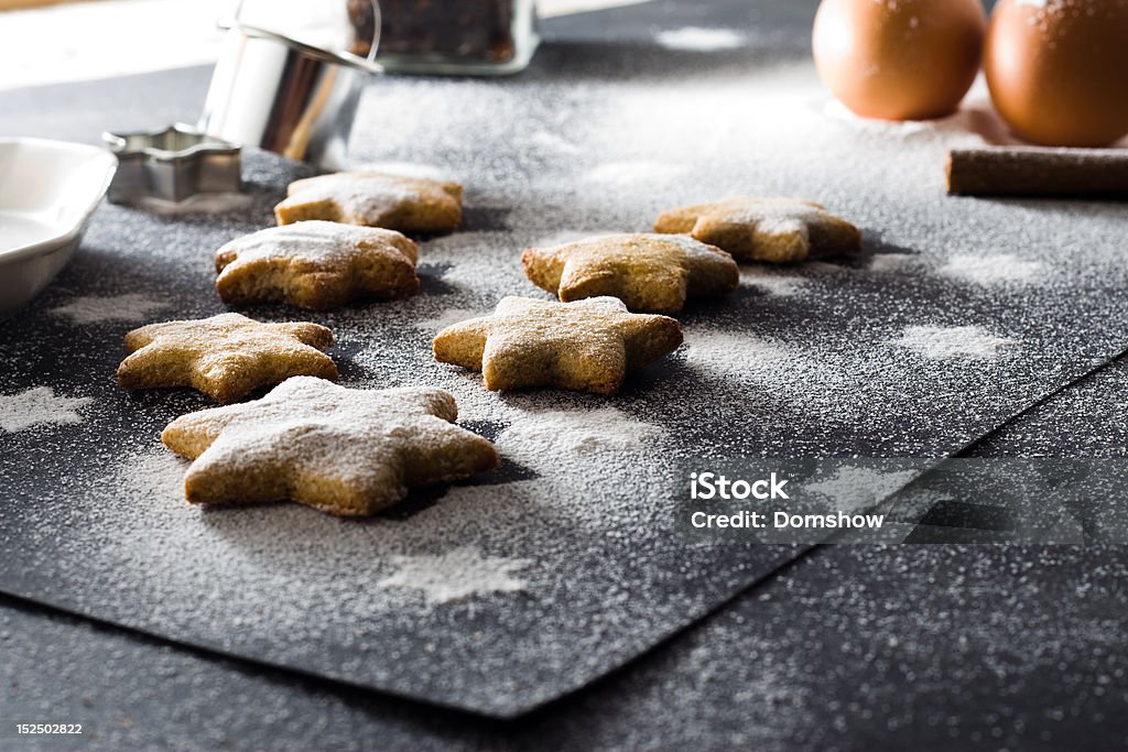 Christmas cookies Baked christmas cookies on black background with ingredients Baked Pastry Item Stock Photo