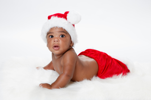 Young Baby in Santa hat and pants